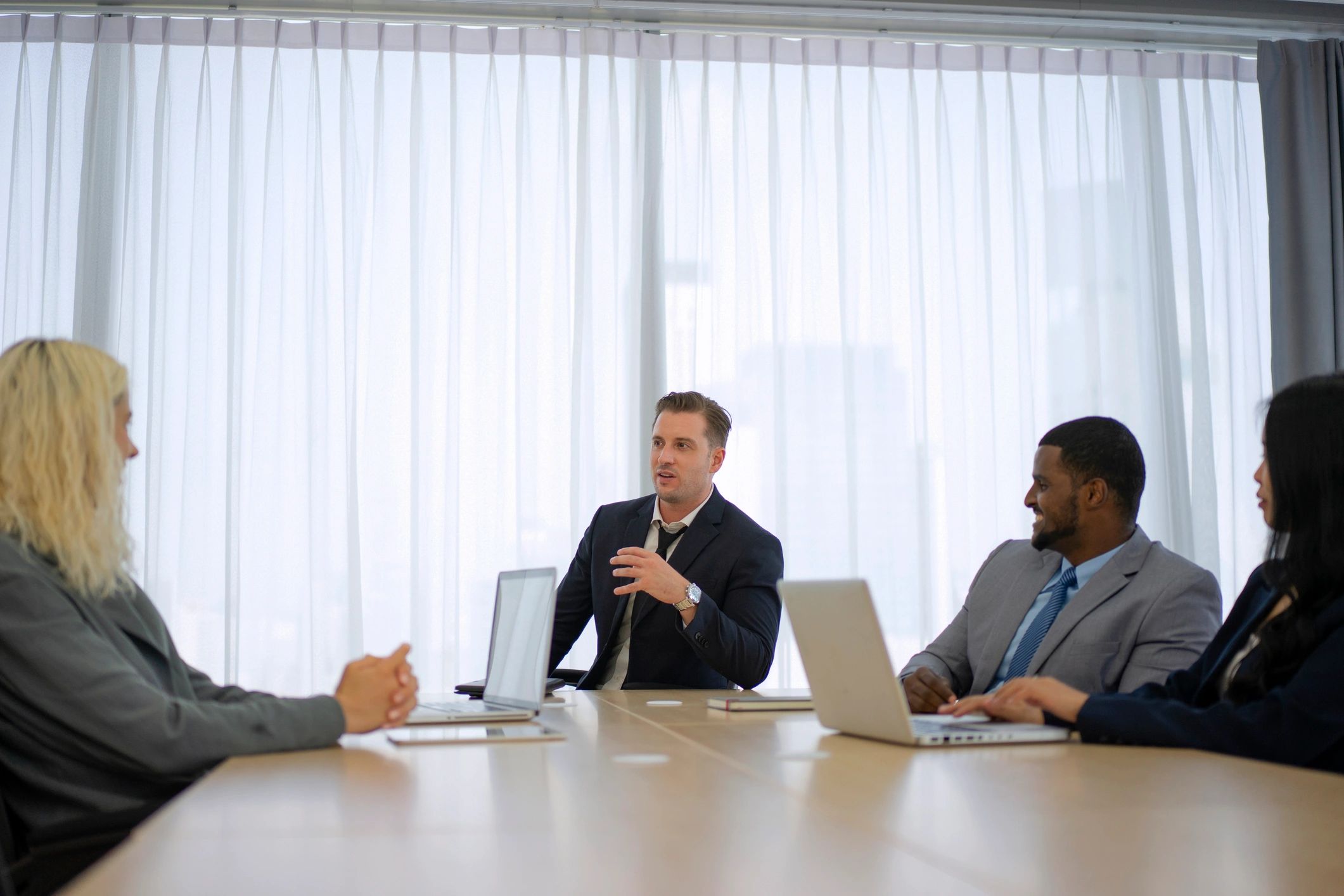 Business professionals meeting in a modern conference room