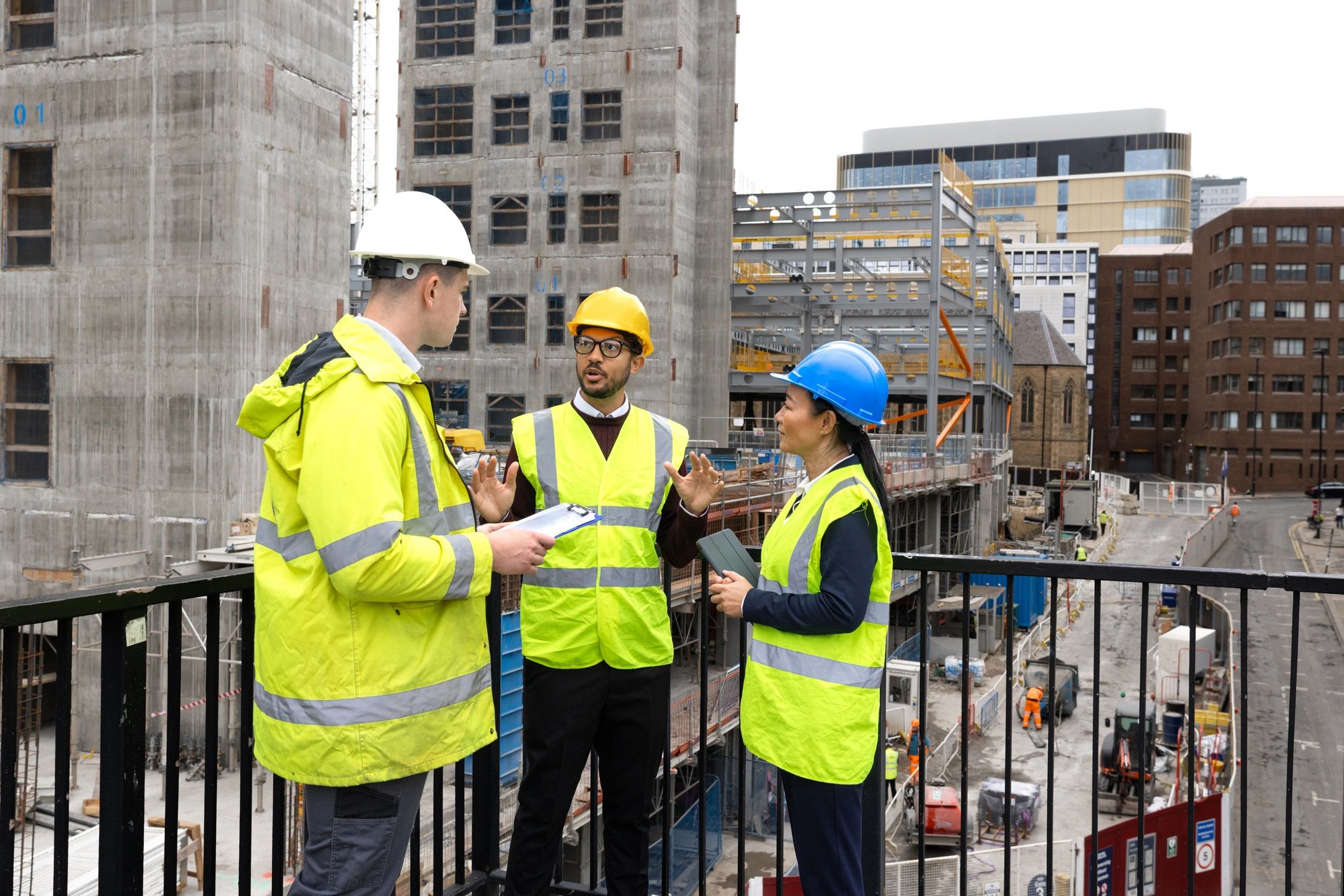 Engineering and construction professionals reviewing project plans